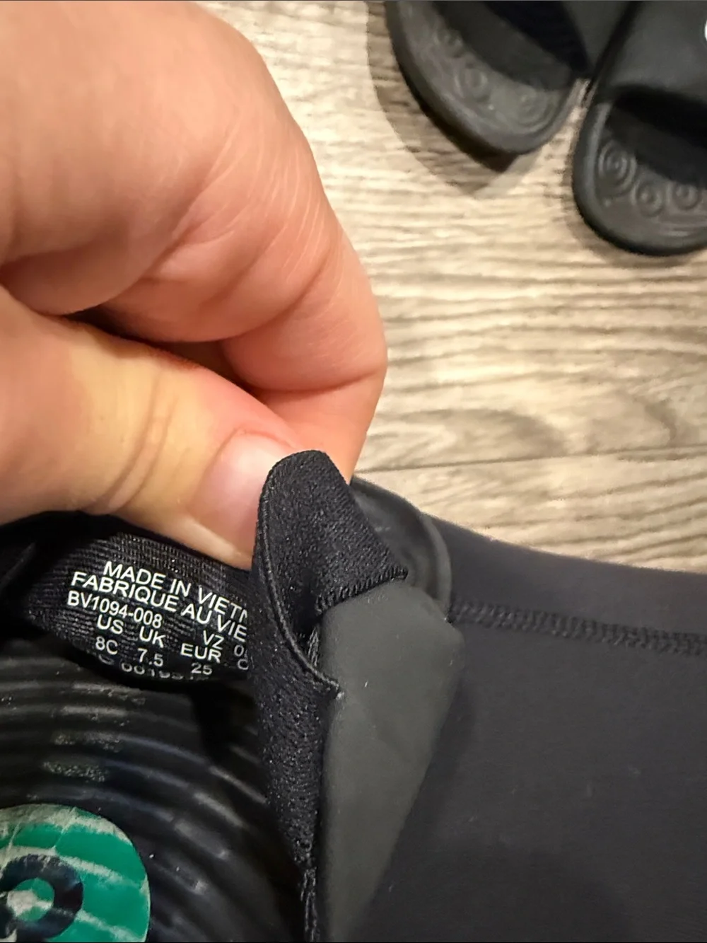Nike Kids Black Slide Sandals with Pink and White Swoosh